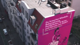 Fassadenwerbung mit einem Mural im Streetart Stil